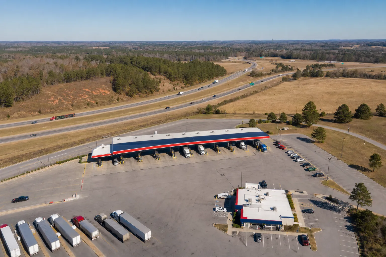 Aerial view of a Petro USA travel center beside a highway
